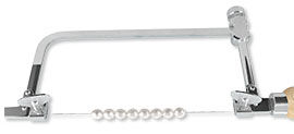 Bead reamer with pearls on the blade